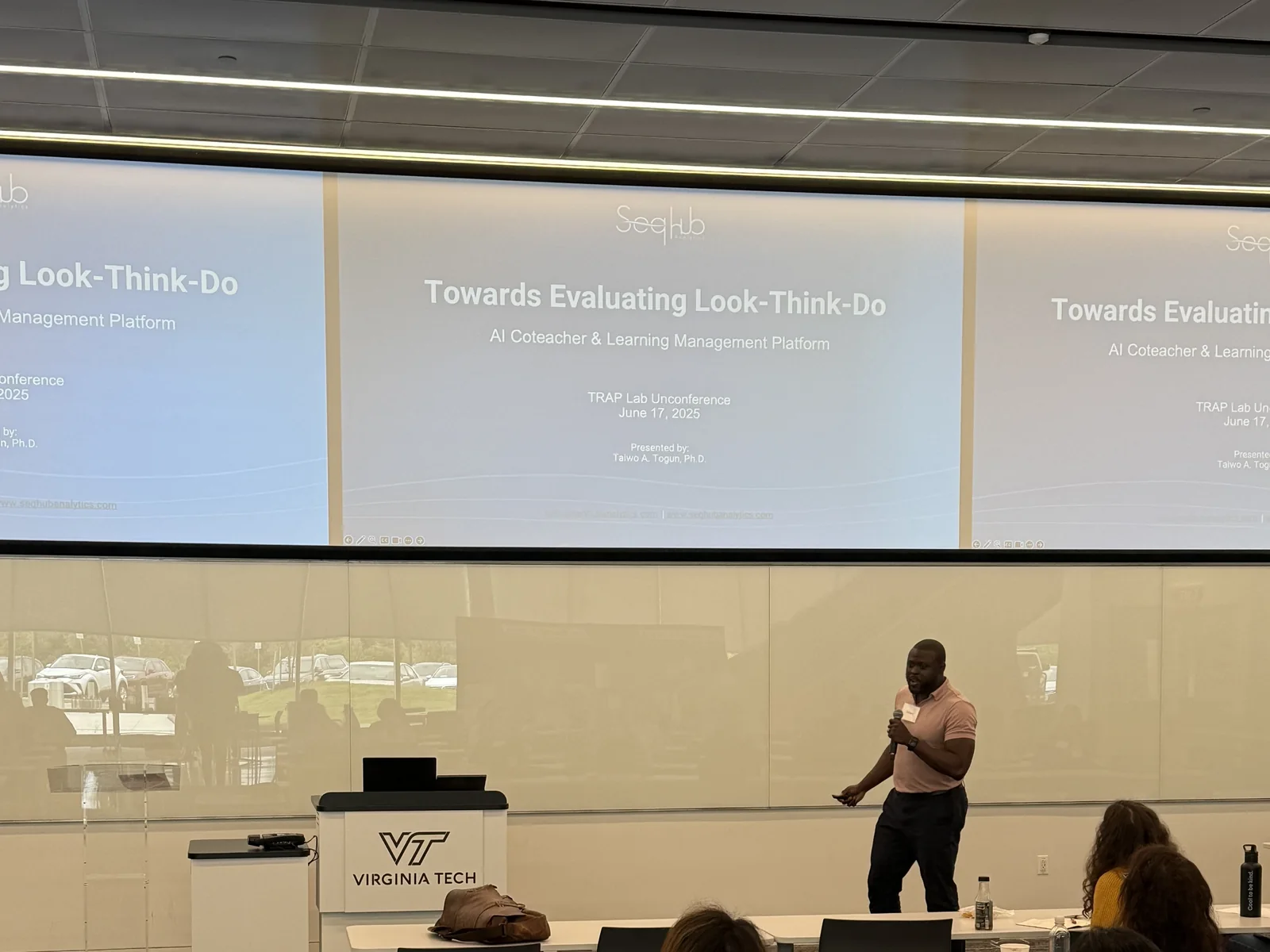 Taiwo Togun presenting Look-Think-Do to an audience